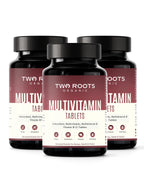 Three bottles of Two Roots Organic Multivitamin Tablets on a white background